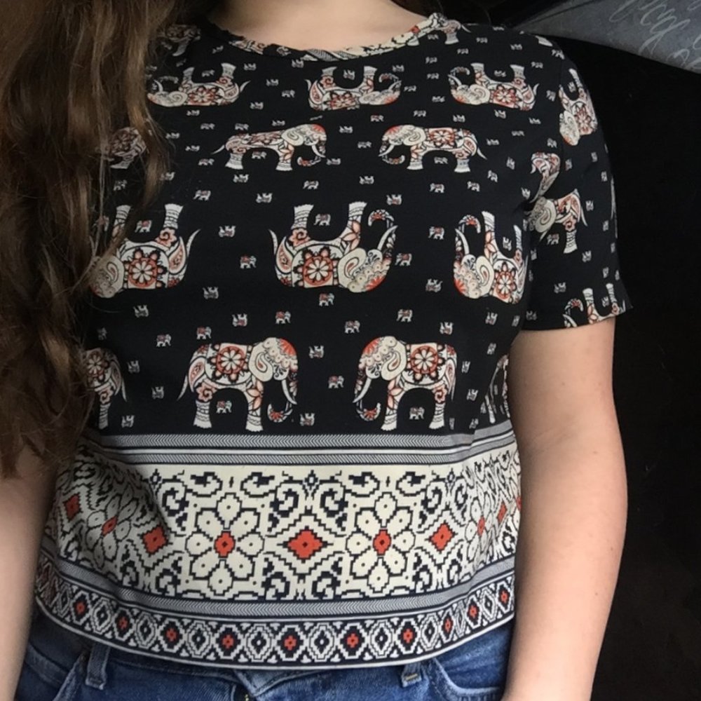 Flattering top with eccentric design